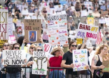 Federal judge partially blocks Trump’s effort to deny funding to pro-DEI public schools