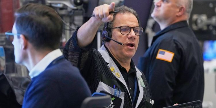 Stock market sinks as AI and interest rate worries grip investors