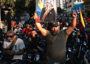 Mobs of motorcycle-riding armed militia hunt Venezuelan streets for Trump supporters as crackdown intensifies